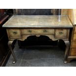 A reproduction George I style walnut cross and feather banded dressing table,