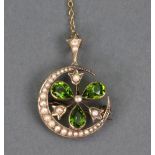 A gold, peridot and seed pearl pendant brooch,
