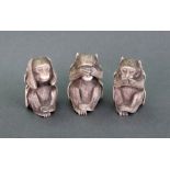 Three Japanese ivory figures of the three wise monkeys,