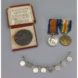 A First World War medal and Victory medal to 144535 Pte. J.W.Bizzill.Labour Corps., a boxed R.M.S.