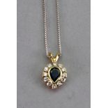 An 18ct gold, sapphire and diamond cluster pendant,