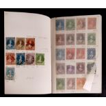 The balance of a small collection of stamps in a note book including much Great Britain,