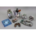 A collection of video recorder heads and parts, including drum assemblies,