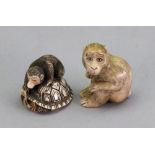 Two Japanese ivory netsuke of monkeys, one carved as a monkey seated on a tortoise, 3.