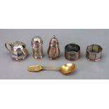 Two silver napkin rings, one engine turned, one octagonal, monogrammed,