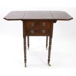 A Regency mahogany ebony strung Pembroke table, with hinged drop leaves, two end drawers,