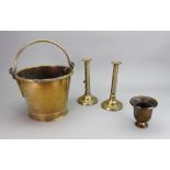 A brass pail, 19th century, with line engraved bands and swing handle, 21cm diameter,