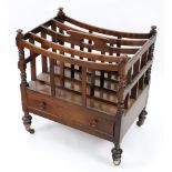 A George IV rosewood four division Canterbury, with curved top rails and slatted sides,