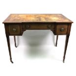 An Edwardian mahogany satinwood crossbanded boxwood and ebony strung writing table,