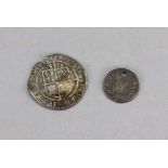 An Elizabeth I hammered silver shilling 1571, and a Spanish silver reales, drilled (2).