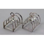 A pair of arched five bar silver toast racks, Charles S. Green & Co, Birmingham 1948, 7.