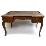 A Louis XV style oak bureau plat, late 19th century,