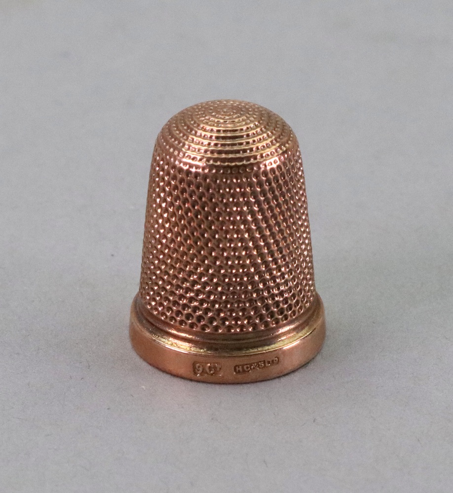 An Edwardian gold thimble, detailed 9ct, Henry Griffith & Sons, 5.4g.