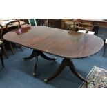 A reproduction Regency style mahogany 'D' end dining table, the reeded edge top with extra leaf,