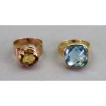 A gold and topaz rubover set ring, ring size R, 11.