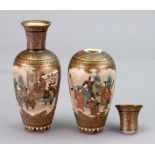 A pair of Japanese Satsuma miniature vases, Meiji period, of slender ovoid form,