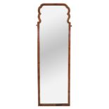 An early 18th century style walnut frame pier mirror, late 19th century, with shaped surmount, 152.