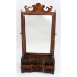 An early 18th century walnut swing toilet mirror,