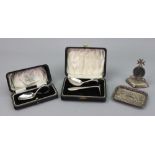 A Maltese silver menu holder, inset with a coin,