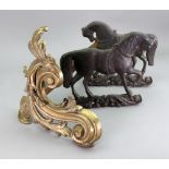 A pair of Victorian lead figures of horses, on leafy scrollwork bases,