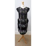 A Vintage black beaded dress.