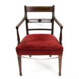 A George III mahogany open arm elbow chair, with reeded frame,
