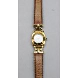 Gucci; a lady's 6300L gold plated quartz wristwatch,