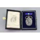 A cased silver and coloured enamel Masonic medal, Toye & Co, London 1951,