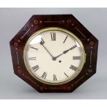 A Regency octagonal mahogany rosewood crossbanded wall timepiece, with brass and ebony ornament,