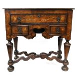 A walnut floral marquetry and strung lowboy, late 17th/early 18th century,