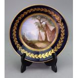 A Sevres style blue ground saucer, late