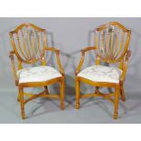 A pair of George III style mahogany shieldback open armchairs, (2).