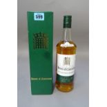 A bottle of twelve year old 'House of Commons' whisky, signed by Margaret Thatcher, boxed.