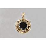 A Victorian gold, banded agate and black enamelled mourning pendant, of circular form,