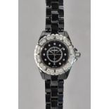 A Chanel J12 diamond dial black ceramic quartz watch H2000.