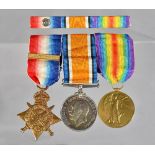 A group of three First World War medals, comprising; The 1914 Star with sew on bar to L3 / 2649. S.