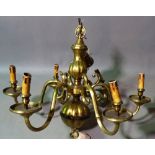 A 20th century Dutch style six branch brass chandelier, 63cm high.