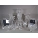 Glassware, including; a Waterford pineapple vase, cut glass bowls, vases, photo frames and sundry,