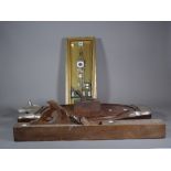 A 20th century hardwood and metal mounted tray formed as a cow,