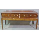A 19th century mahogany three drawer side table,