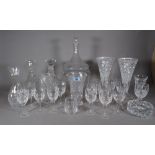 Glassware, including; a part suite of Stuart cut glass, decanters, vases and sundry, (qty).