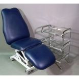 An electric adjustable medical chair and stainless steel three tier trolley, (2).