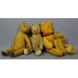 A group of four early 20th century golden hair Teddy bears with jointed limbs, (a.f.) (4).