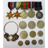 A group of five medals, comprising; The 1939-1945 Star, The Atlantic Star, The Defence Medal,