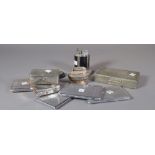 Collectables, including; two 20th century table top lighters and a group of plated cigarette cases,