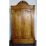 A 19th century French pine two door wardrobe, 107cm wide x 201cm high.