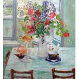 Russian School (20th century), Still life of flowers on a table set for tea, oil on canvas,