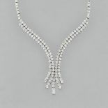 A white gold and diamond set necklace, formed as an articulated symmetrical scroll,