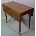 A Regency mahogany drop flap table on turned supports, 46cm wide x 92cm long.