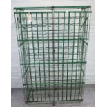 A green painted wrought iron wine rack, early 20th century,